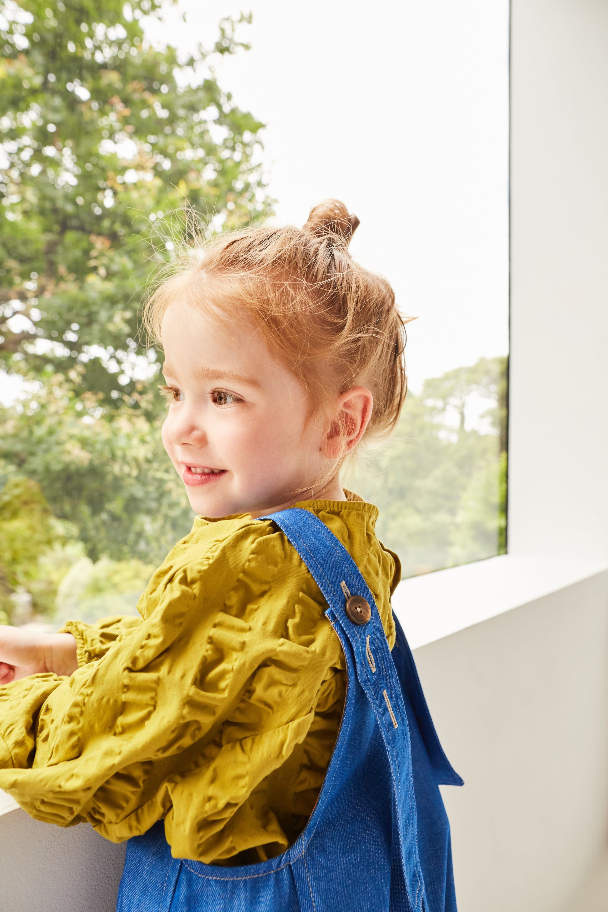 Kai Dungarees styled with Studio Koter organic cotton top showing versatile layering options
